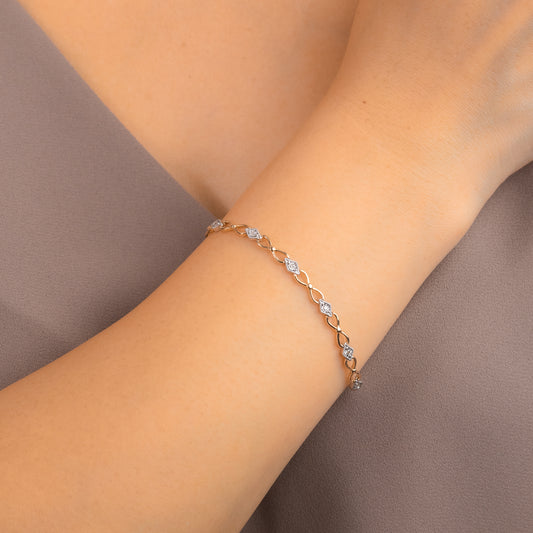 Diamond Link Bracelet in 10K Yellow and White Gold (0.10 ct tw)